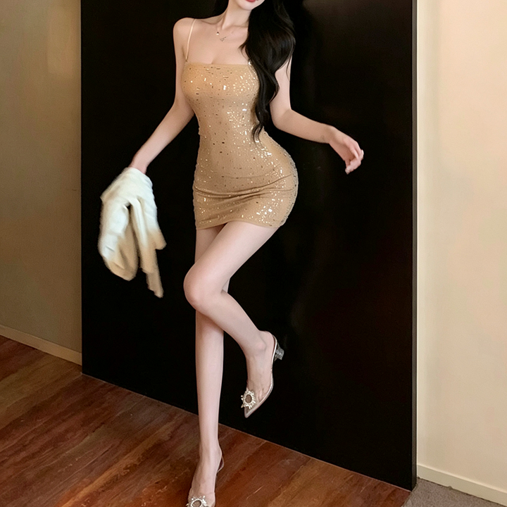 Champagne-colored shimmering dress with delicate straps