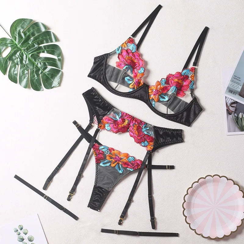 Four-piece set of colorful embroidered floral lingerie.